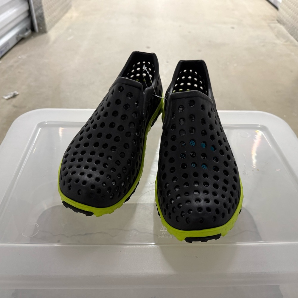 Black Perforated Slip-On Shoes with Neon Green Soles